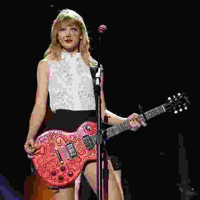 Taylor Swift Performing Live, Her Guitar In Hand, Captivating Her Audience With Her Raw Emotions And Passionate Vocals. Taylor Swift Speak Now Songbook: Easy Guitar With Notes Tab